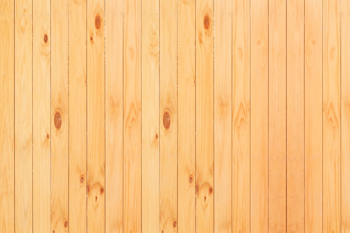 Close view of clean, light-toned structural wood panels
